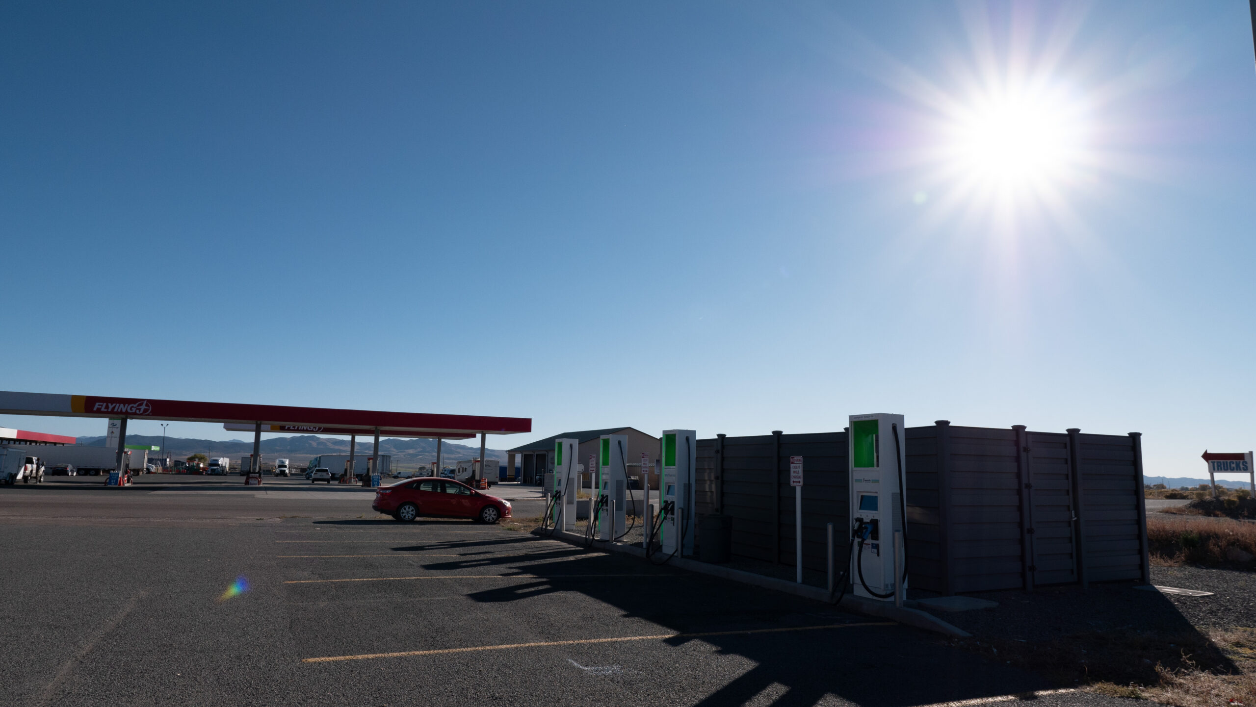 Public fast charging station under clear skies