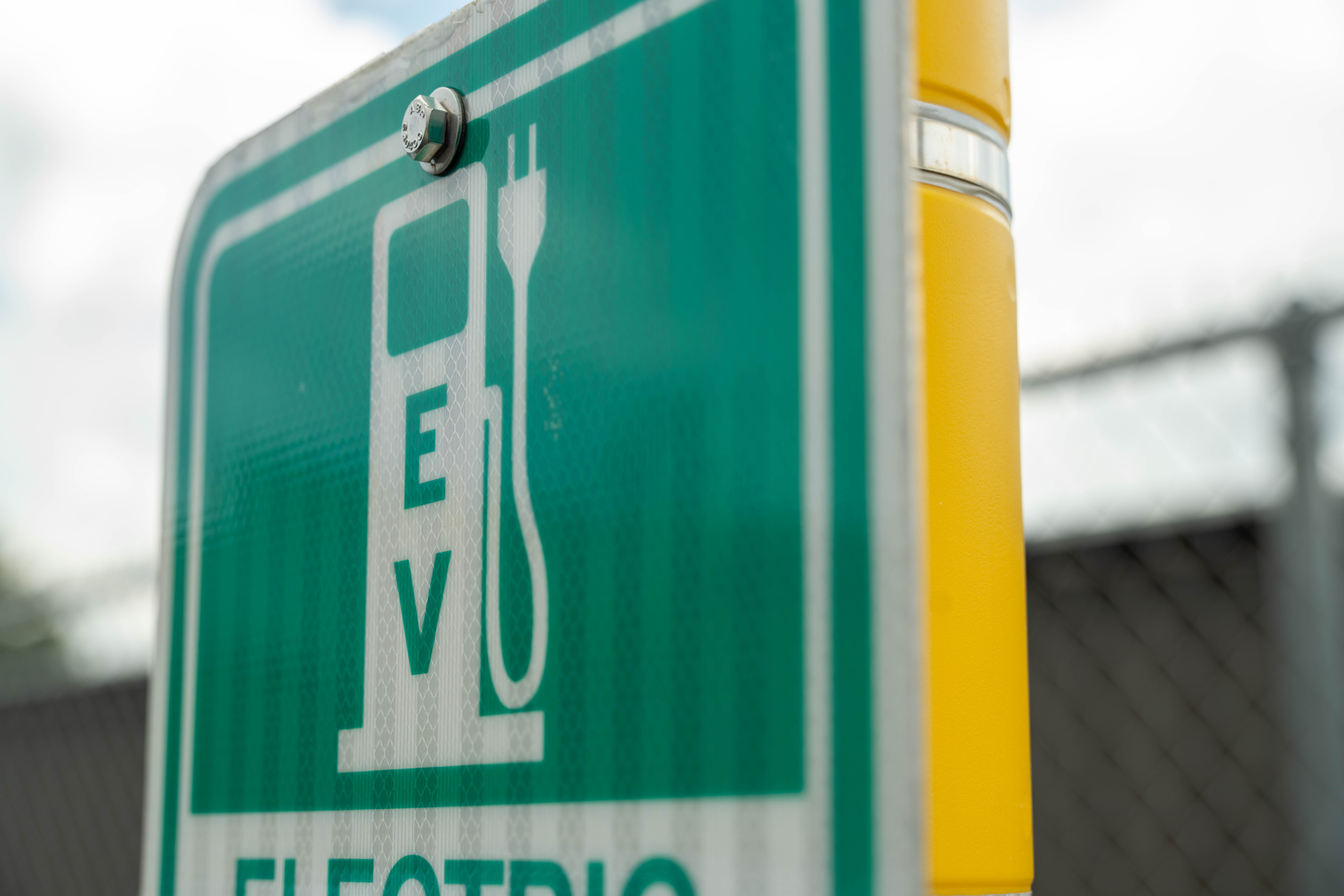 A close shot of an electric vehicle charging sign